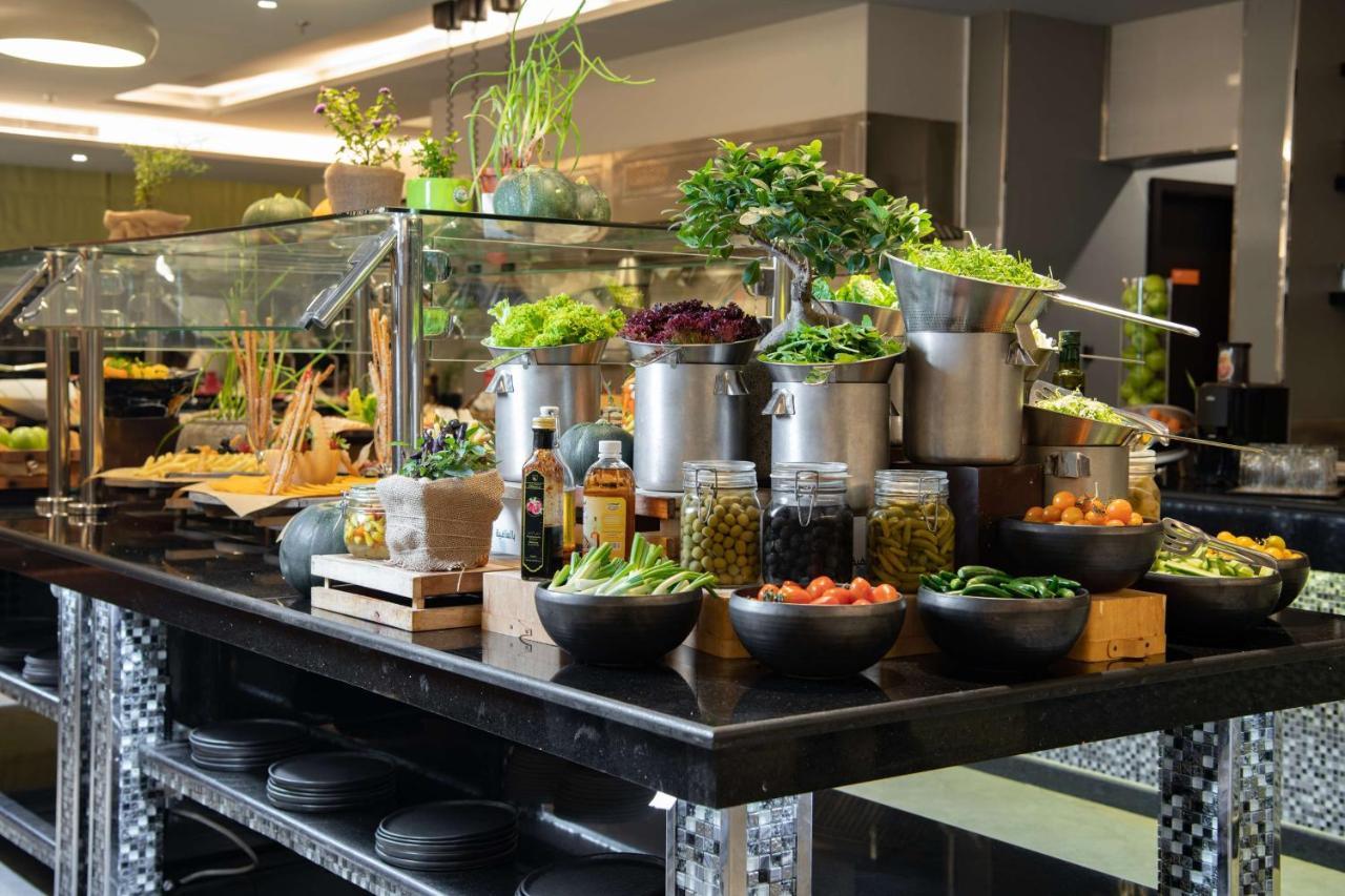 Radisson Hotel & Apartments Dammam Industrial City ภายนอก รูปภาพ
