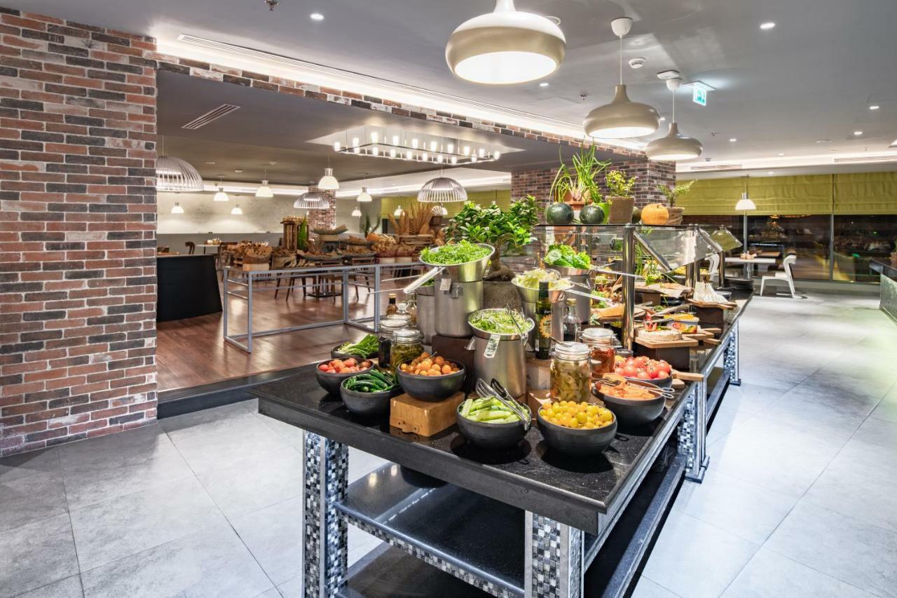 Radisson Hotel & Apartments Dammam Industrial City ภายนอก รูปภาพ